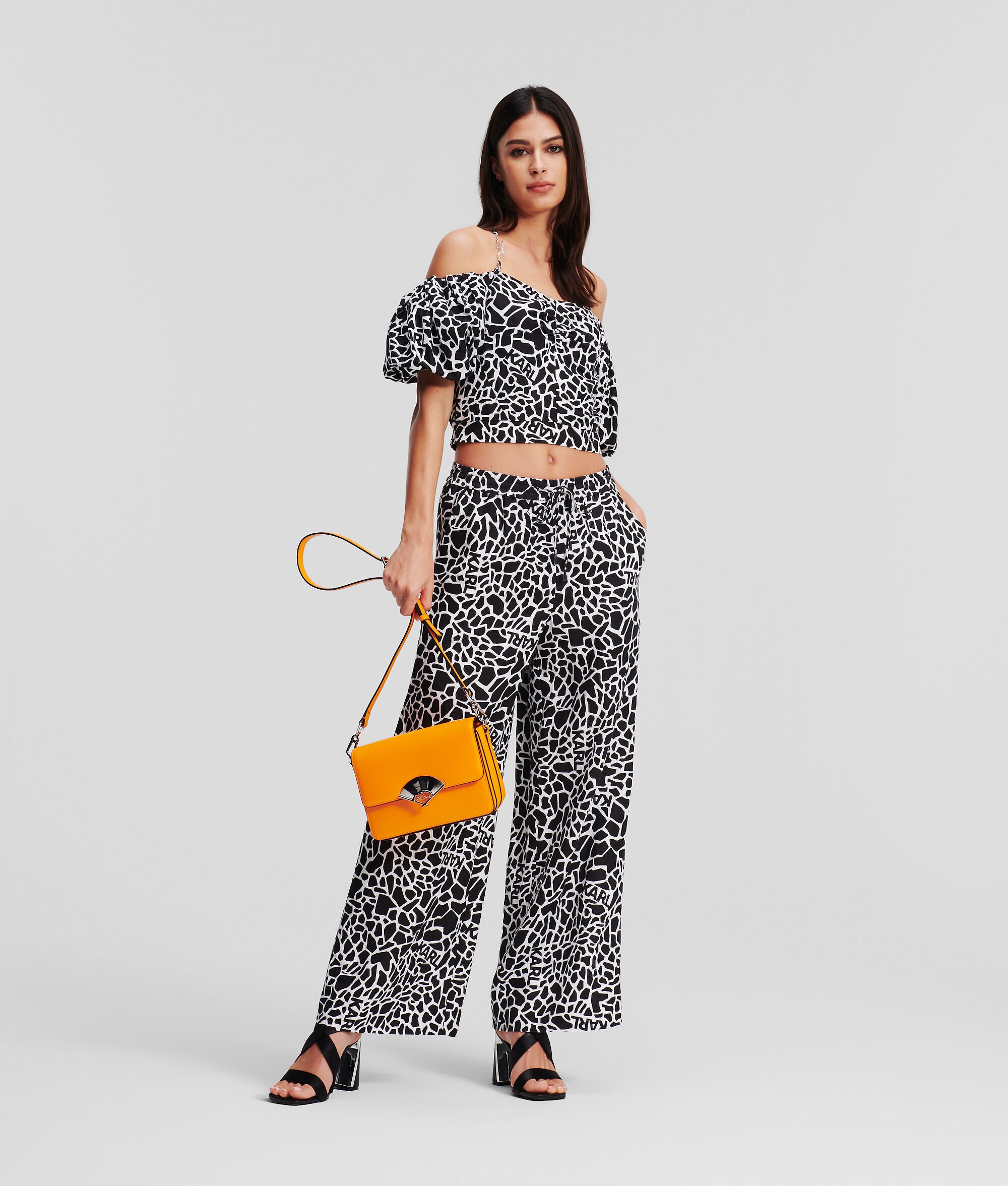 (image for) Clear Giraffe-Print Linen Trousers